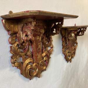 Pair of Highly Decorative Red Gilt Carved Wall Sconces Shelves