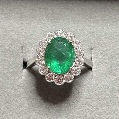 18ct White Gold Oval Emerald and Diamond Cluster Ring image-1