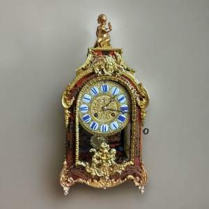 19th Century French Boulle Striking Clock in Red Boulle Case.