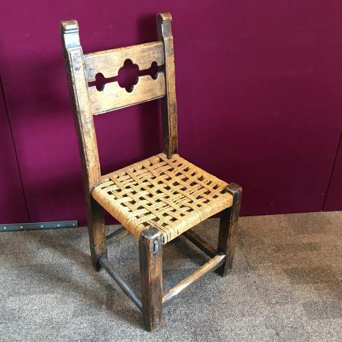 Naive 17th Century Walnut Chair with Village Stocks Back image-1