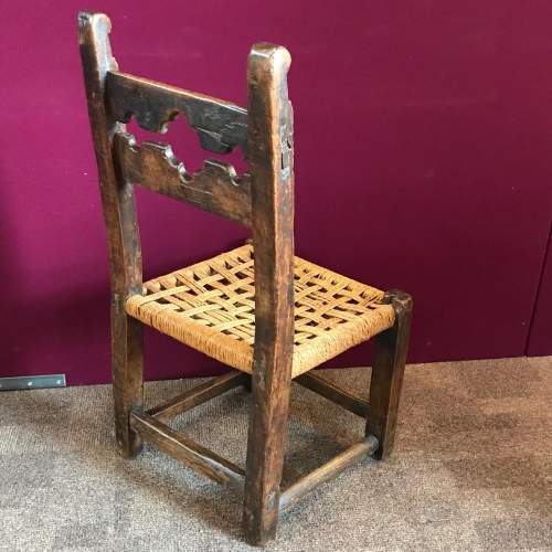 Naive 17th Century Walnut Chair with Village Stocks Back image-4