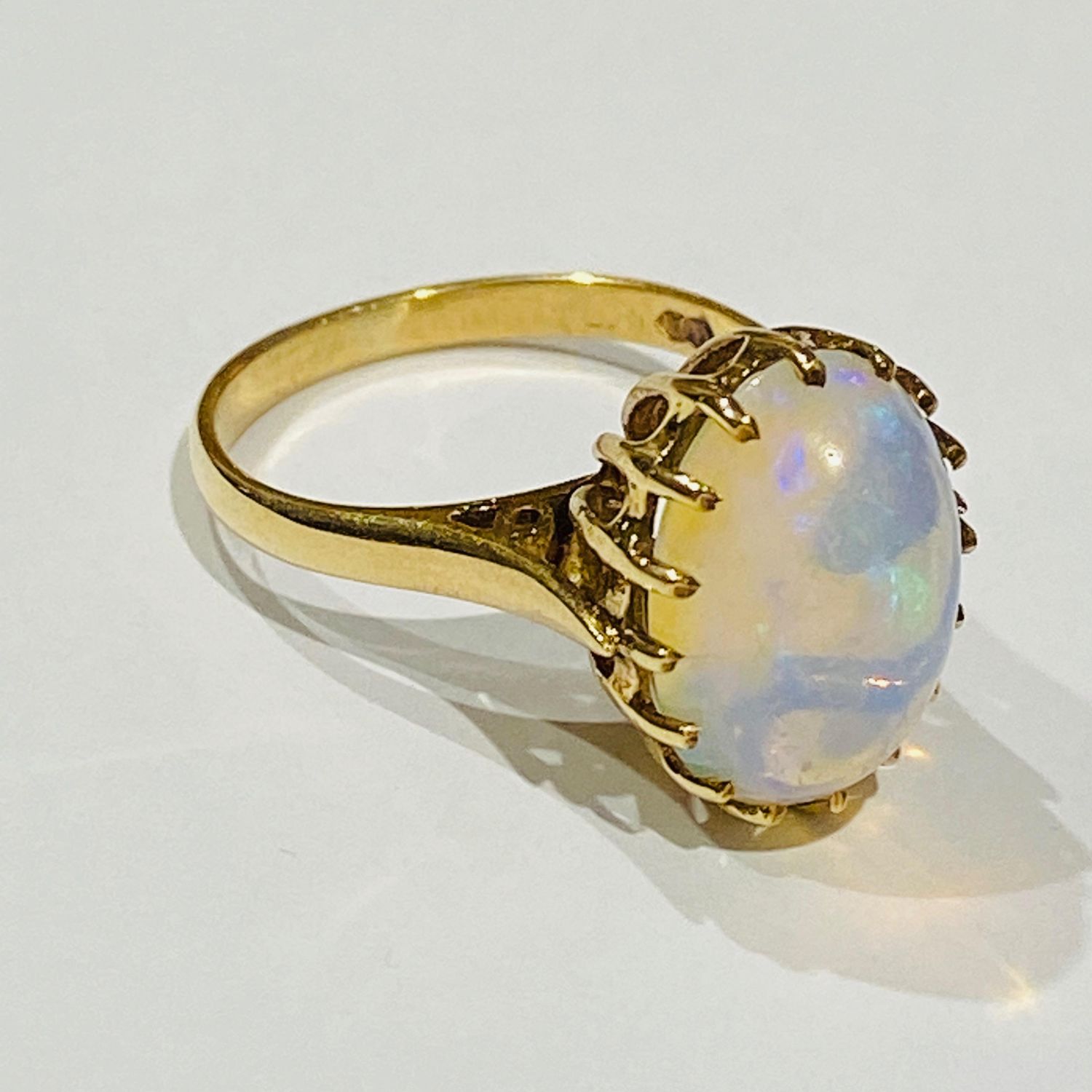 Opal solitaire ring