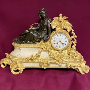 French Bronze and Gilded Bronze Clock with Maiden