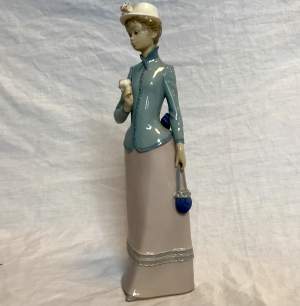 Lladro Ceramic Figurine of Girl With Rose