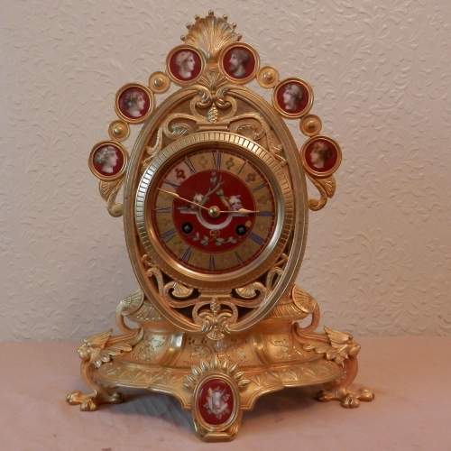 Gilt Bronze Mantel Clock with Red Porcelain Panels image-1