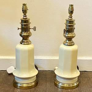 Pair of 20th Century Cream Ceramic and Brass Plated Lamps