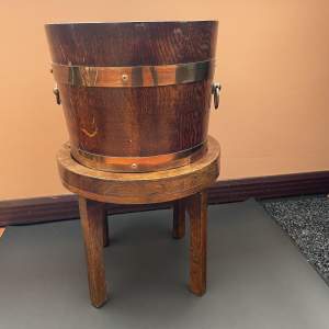 An  Edwardian  R.A Lister and Co Dursley Oak Jardiniere Bucket