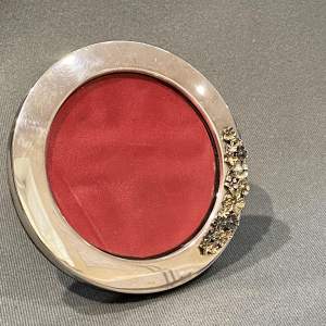 Silver Circular Frame with Floral Decoration by Stuart Devlin