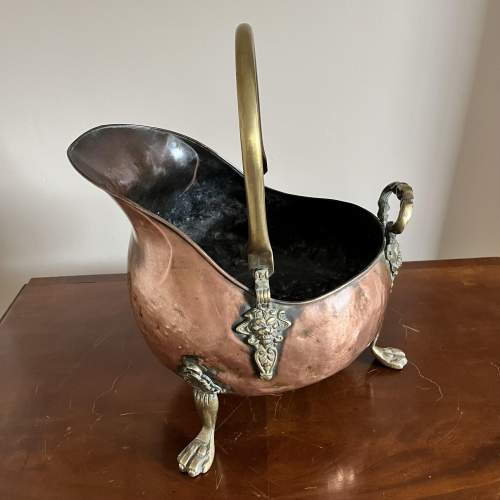 A Late Victorian Copper & Brass Coal Scuttle with Claw Paw Feet. image-4