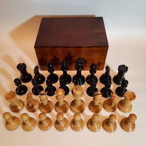 A Fine Boxwood and Ebony Chess Set image-1