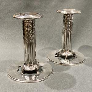 Pair of Liberty and Co Archibald Knox Tudric Pewter Candlesticks