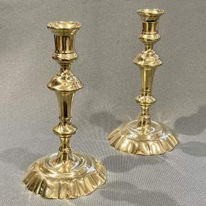Pair of Georgian Seamed Brass Petal Based Candlesticks