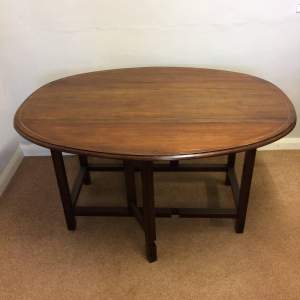 Drop Leaf Mahogany Dining Table with Brass Inlay