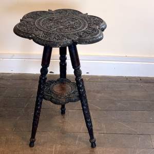 Intricately Carved Eastern Three Legged Table