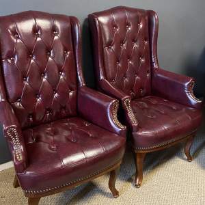 A Pair of Contemporary Shallow Wingback Chairs