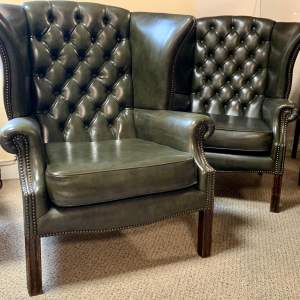 Pair of Green Leather Chesterfield Winged Back Chairs