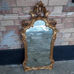 A Carved Gilt Wooden Ornate Framed Wall Mirror