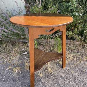 A Beautiful Arts And Crafts Oak Circular Cricket Style Table