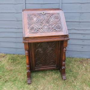 Late 19th Century Carved Oak Bureau of Small Proportions