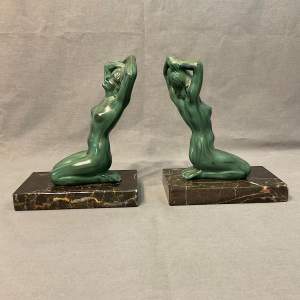 A Pair of Art Deco Kneeling Female Figure Bookends