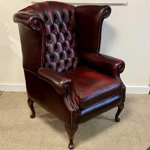 20th Century Deep Buttoned Oxblood Leather Wingback Armchair