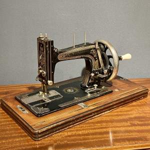 Housewifes Delight Sewing Machine