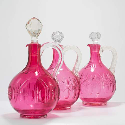 Three Victorian Cranberry Glass Decanters with Stoppers image-1