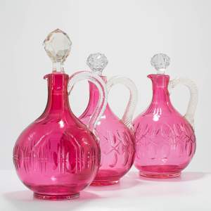 Three Victorian Cranberry Glass Decanters with Stoppers