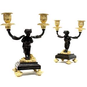 Pair of 19th Century Gilt and Patinated Bronze Putti Candlesticks