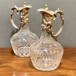 Pair of Heavy Cut Crystal and Silver Plate Claret Jugs