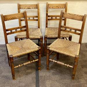 Early 19th Century Set of Four Rush Seated Elm Chairs