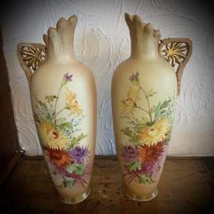 A Matching Pair of Hand Painted Blush Ivory Ewers