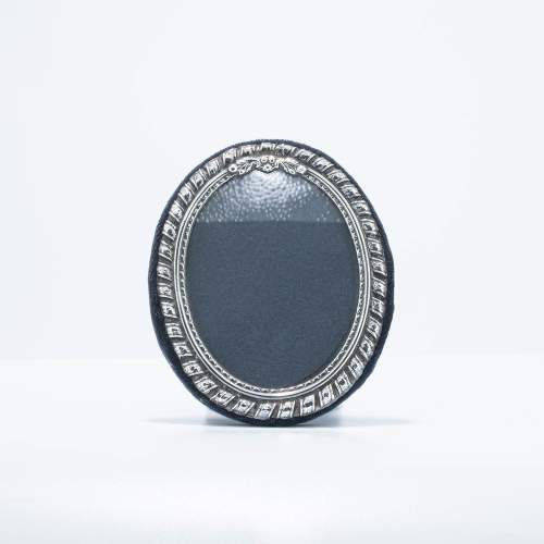 A Small Sterling Silver Fronted Easel Oval Photograph Frame image-1
