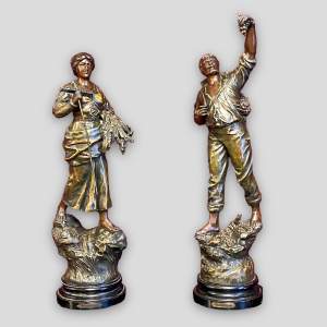 Pair of Spelter and Bronze Figures