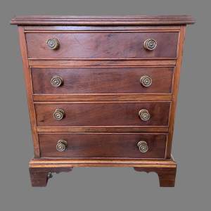 A Miniature Mahogany Chest of Drawers