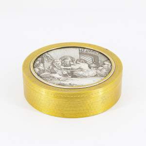 An Antique French Round Gilt Metal Box and Cover