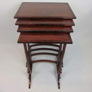 A Quality Nest of Four Quilted Mahogany Tables