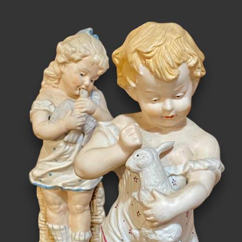 Pair of Bisque Figures of a Boy and Girl image-3