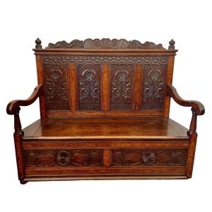 A Fine Quality Inlaid Settle