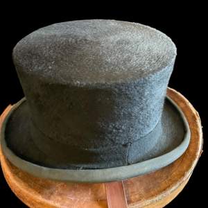 An Early Top Hat and Leather Case