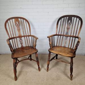 A Harlequin Pair of 19th Century High Back Ash and Elm Windsor Chairs