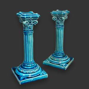 Pair of Arts and Crafts Burmantofts Pottery Candlesticks