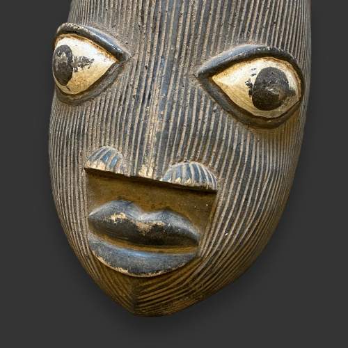 Carved Black and White African Mask image-3