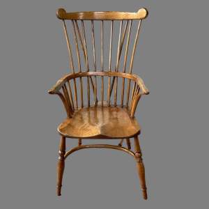 A Stylish Ash and Elm Comb-Back Windsor Chair