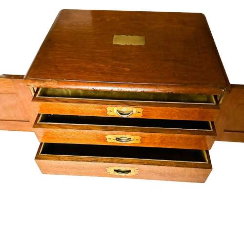 An Edwardian Oak Collectors Cabinet image-1