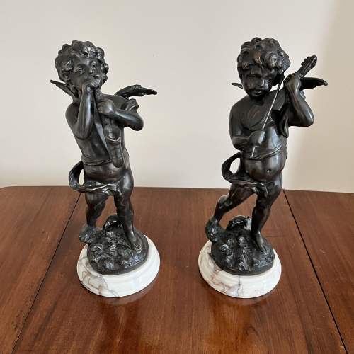 A Pair of Bronzed Cast Metal Cherubs on Marble Bases image-1