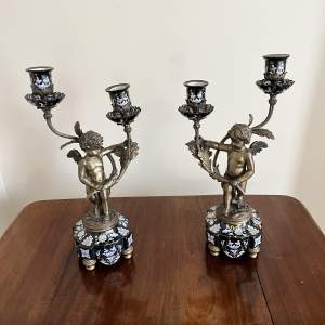 A Pair of Porcelain & Bronze Angel Twin Branch Candleabras