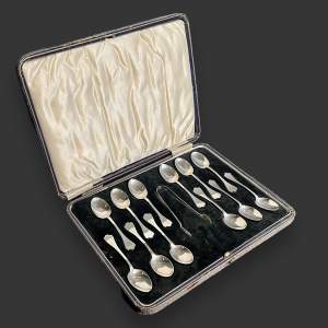 Set of 12 20th Century Silver Trefid Coffee Spoons and Tongs