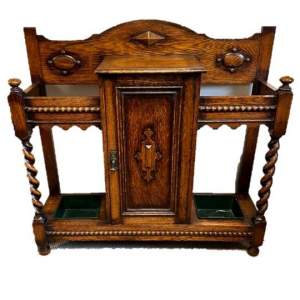 An Oak Arts & Crafts Barley Twist Hall Stand with Cabinet