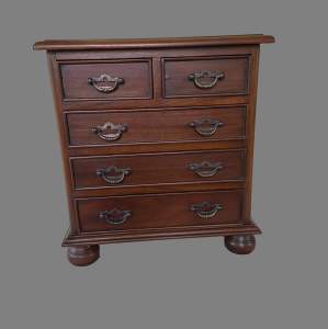 A Miniature Victorian Style Chest of Drawers
